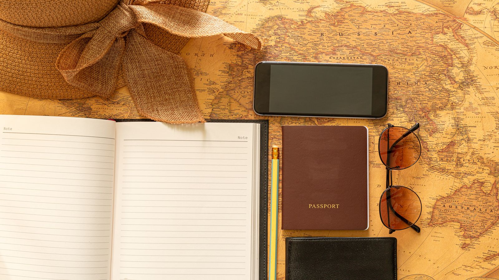 Locally Lost workspace with layout sketches and typography samples spread across a drafting table